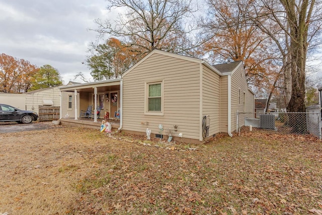 view of front of home featuring central AC unit and covered porch