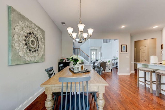 1494 Buttonwood, Chattanooga, TN 37421 - dining room with dark wood-style flooring, baseboards, a chandelier, stairs, and recessed lighting