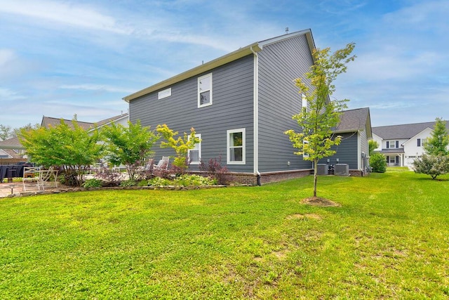 1494 Buttonwood, Chattanooga, TN 37421 - rear view of property with a yard and central AC