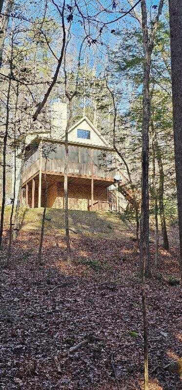 exterior space featuring a wooden deck