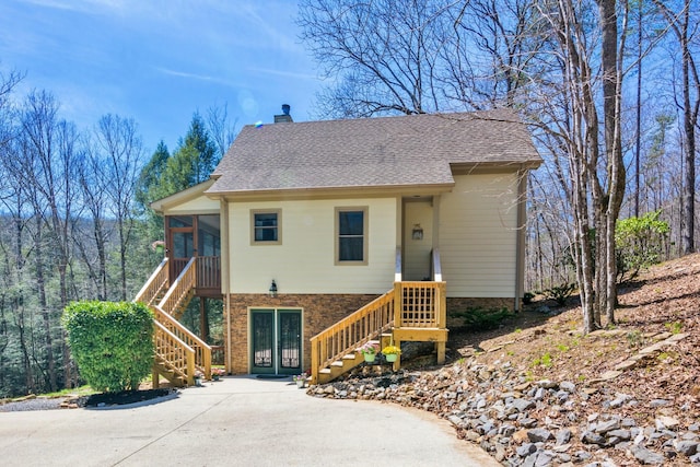 view of front facade featuring a sunroom