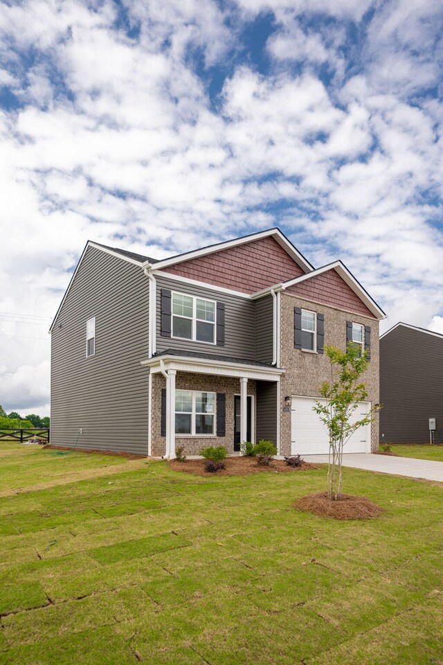 4203 Scenic Trl NE, Cleveland, TN 37323 - craftsman house with driveway, an attached garage, a front lawn, and brick siding