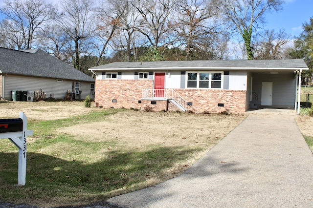 ranch-style home with a carport