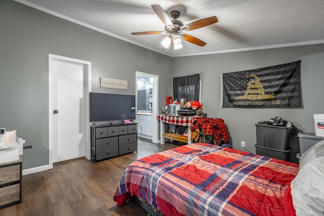 bedroom featuring ensuite bathroom, ornamental molding, a textured ceiling, ceiling fan, and dark hardwood / wood-style floors