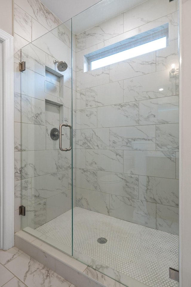 bathroom with an enclosed shower