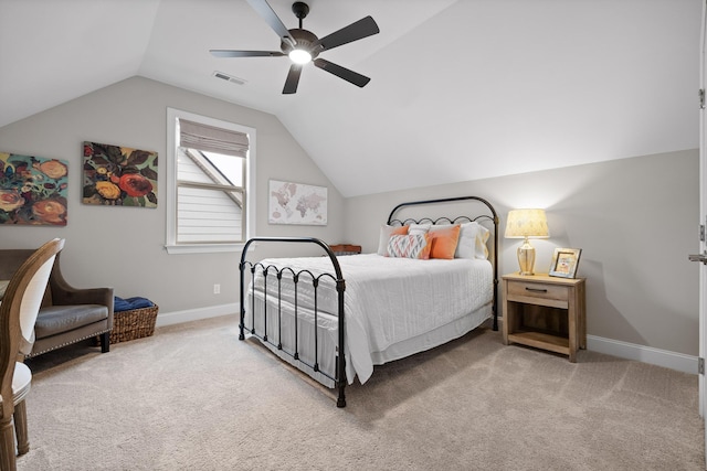 carpeted bedroom featuring ceiling fan and vaulted ceiling