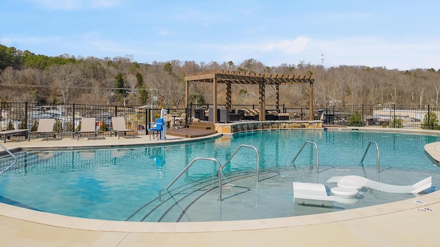 view of pool featuring a pergola and a patio