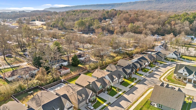 birds eye view of property with a mountain view