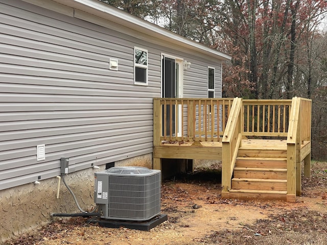 wooden terrace with central air condition unit