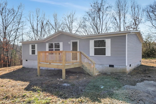 manufactured / mobile home featuring a deck