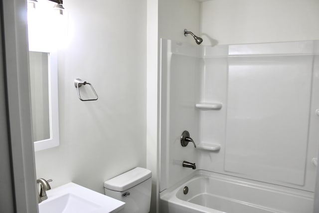 full bathroom featuring shower / bath combination, toilet, and sink