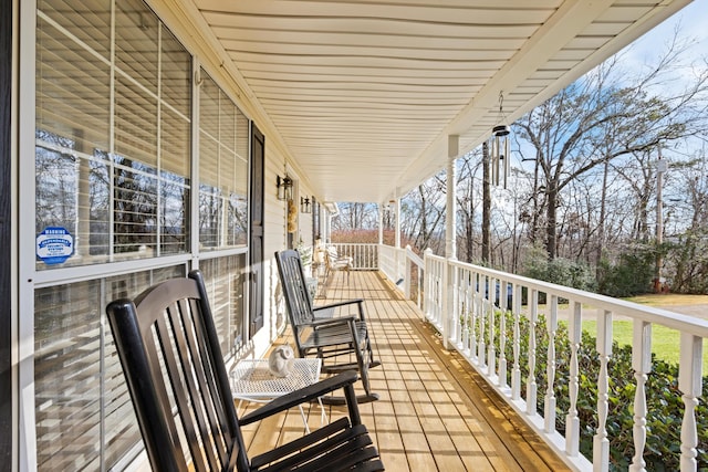 balcony featuring covered porch