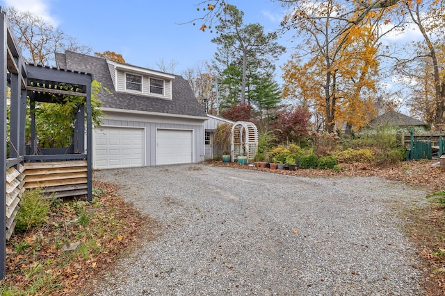 exterior space with a garage