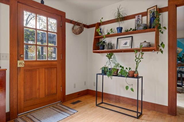 entryway with light wood-type flooring