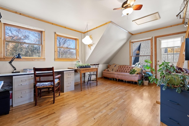 office featuring ceiling fan, light wood-type flooring, ornamental molding, and lofted ceiling