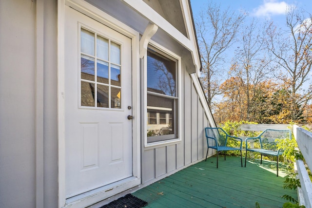 doorway to property with a wooden deck