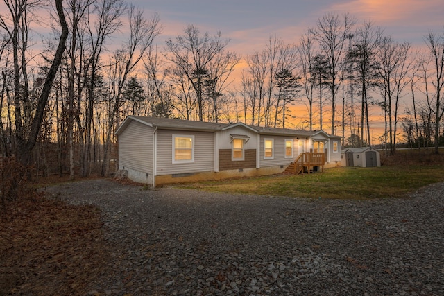 manufactured / mobile home with a shed