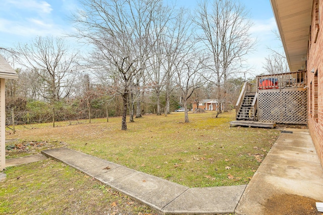 view of yard featuring a deck