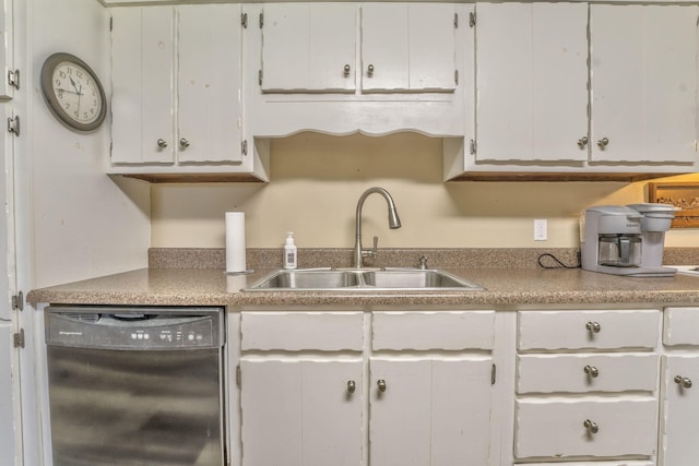 kitchen with white cabinetry, sink, and black dishwasher