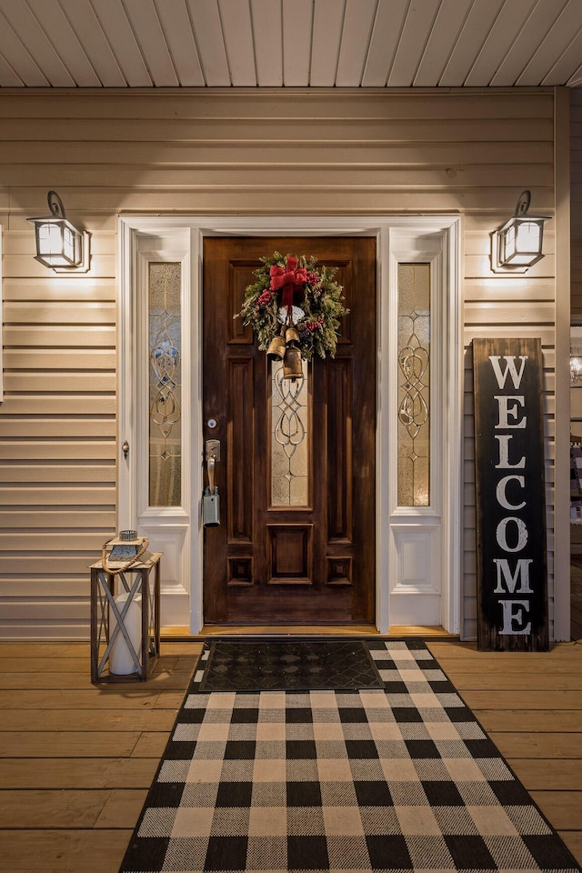 entrance to property with a porch