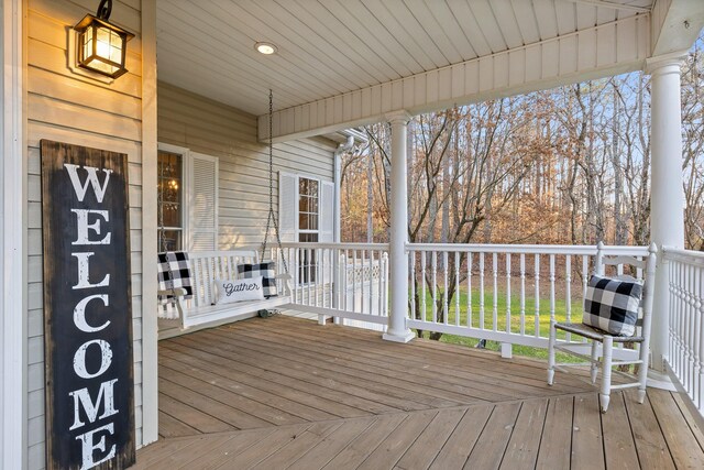 wooden terrace with covered porch