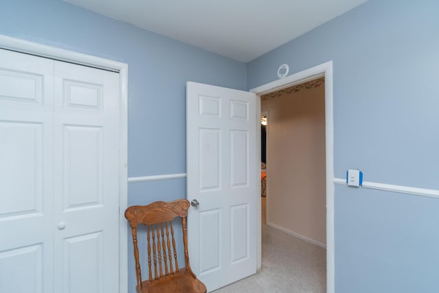 corridor with light colored carpet