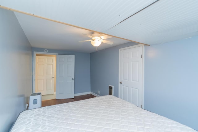 bedroom with hardwood / wood-style flooring and ceiling fan