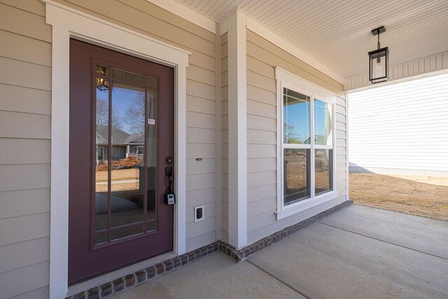 9089 Knolling Loop Unit 87, Ooltewah, TN 37363 - doorway to property with a porch