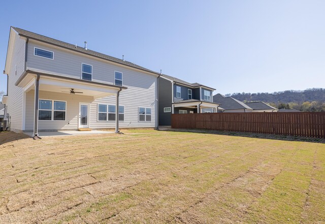 9089 Knolling Loop Unit 87, Ooltewah, TN 37363 - rear view of house with a ceiling fan and a patio