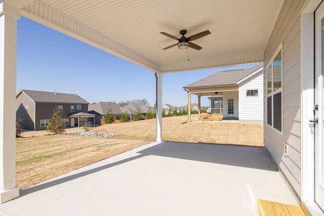 9089 Knolling Loop Unit 87, Ooltewah, TN 37363 - view of patio / terrace featuring a ceiling fan and a residential view