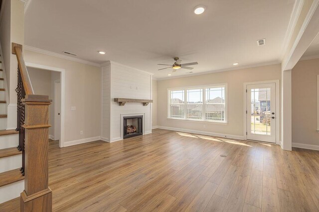 9089 Knolling Loop Unit 87, Ooltewah, TN 37363 - unfurnished living room with a ceiling fan, stairs, light wood finished floors, baseboards, and ornamental molding