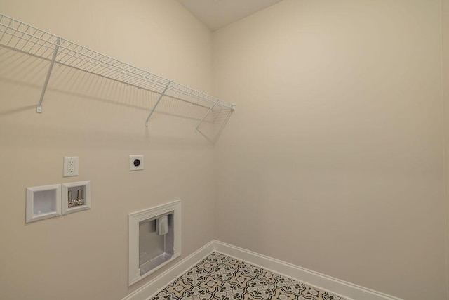 9089 Knolling Loop Unit 87, Ooltewah, TN 37363 - clothes washing area featuring hookup for an electric dryer, baseboards, hookup for a washing machine, and light tile patterned floors
