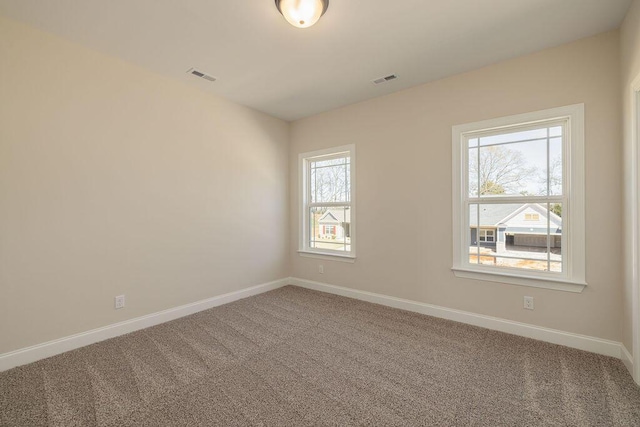 9089 Knolling Loop Unit 87, Ooltewah, TN 37363 - empty room with carpet floors and baseboards