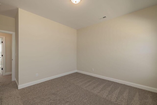 9089 Knolling Loop Unit 87, Ooltewah, TN 37363 - unfurnished room with carpet floors and baseboards
