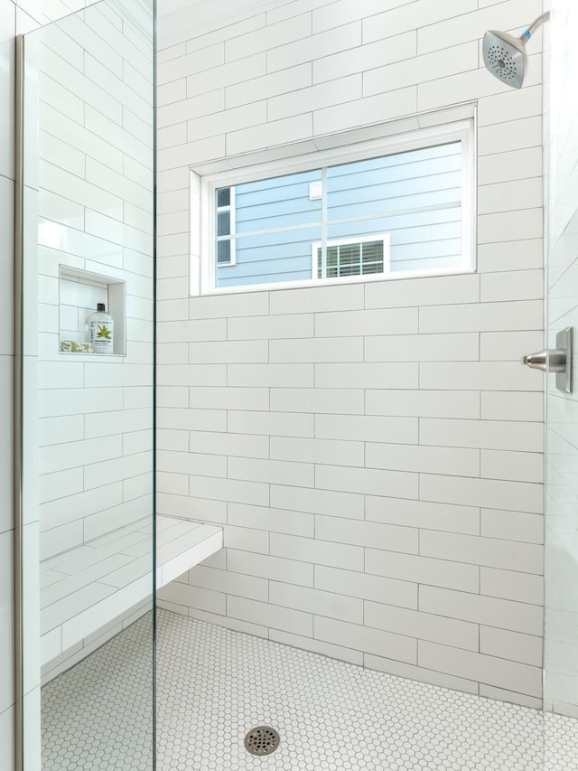 bathroom featuring walk in shower