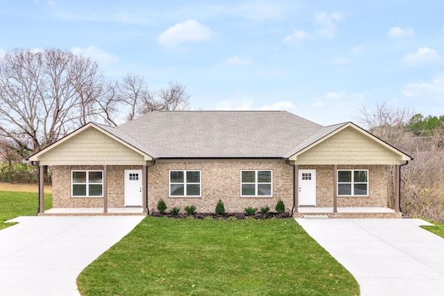 view of front of home featuring a porch and a front yard