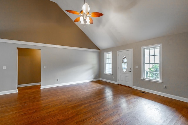 entryway with dark wood-type flooring, plenty of natural light, and a ceiling fan