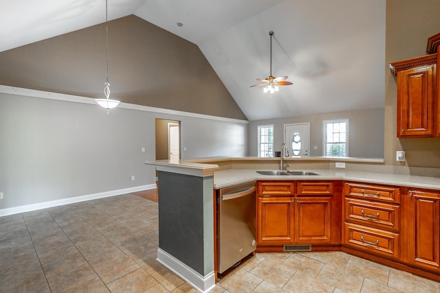 kitchen featuring visible vents, dishwasher, open floor plan, light countertops, and a sink