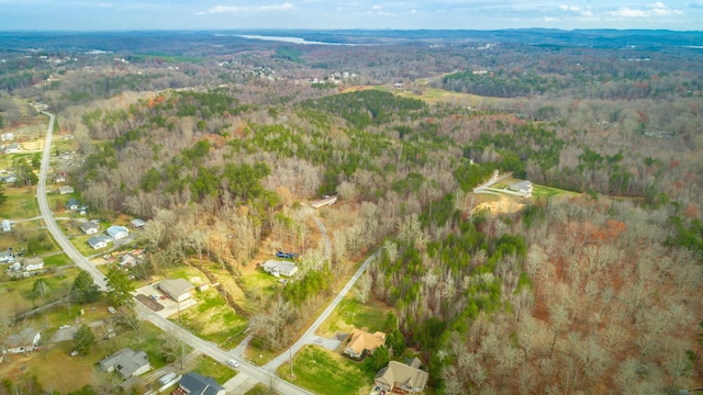 bird's eye view featuring a view of trees