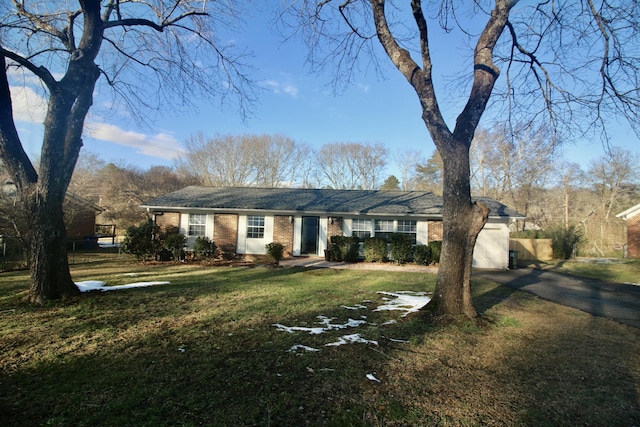 ranch-style house with a front yard