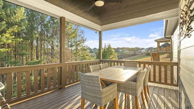 wooden terrace with ceiling fan