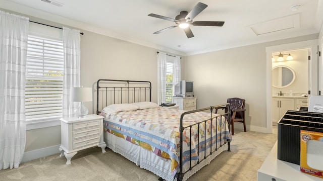 bedroom with light carpet, ensuite bathroom, ceiling fan, and ornamental molding