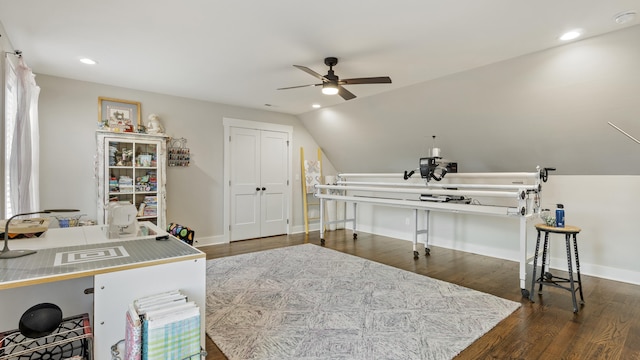 office featuring vaulted ceiling, ceiling fan, and dark wood-type flooring