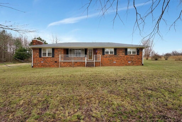 ranch-style house with a porch and a front yard