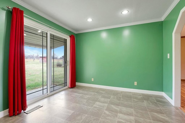 unfurnished room with ornamental molding