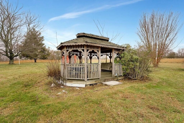 exterior space featuring a gazebo and a lawn