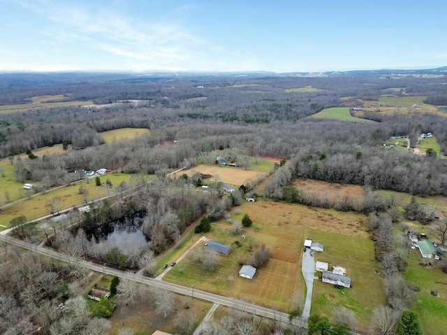 birds eye view of property featuring a rural view