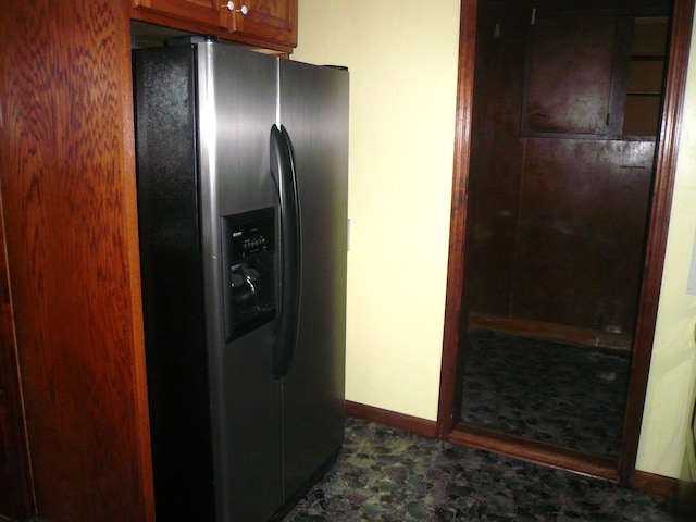 kitchen with stainless steel fridge with ice dispenser