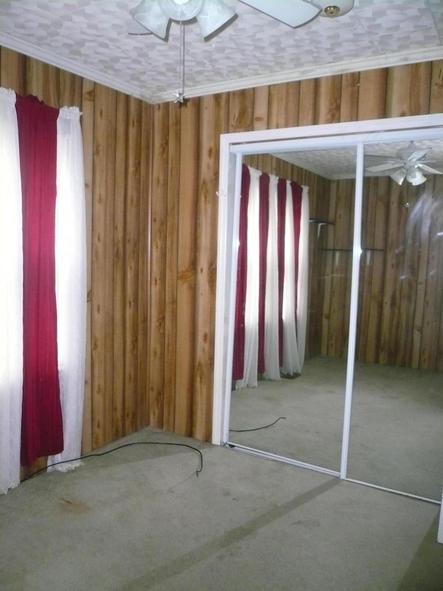 unfurnished bedroom with ceiling fan, a closet, and a textured ceiling