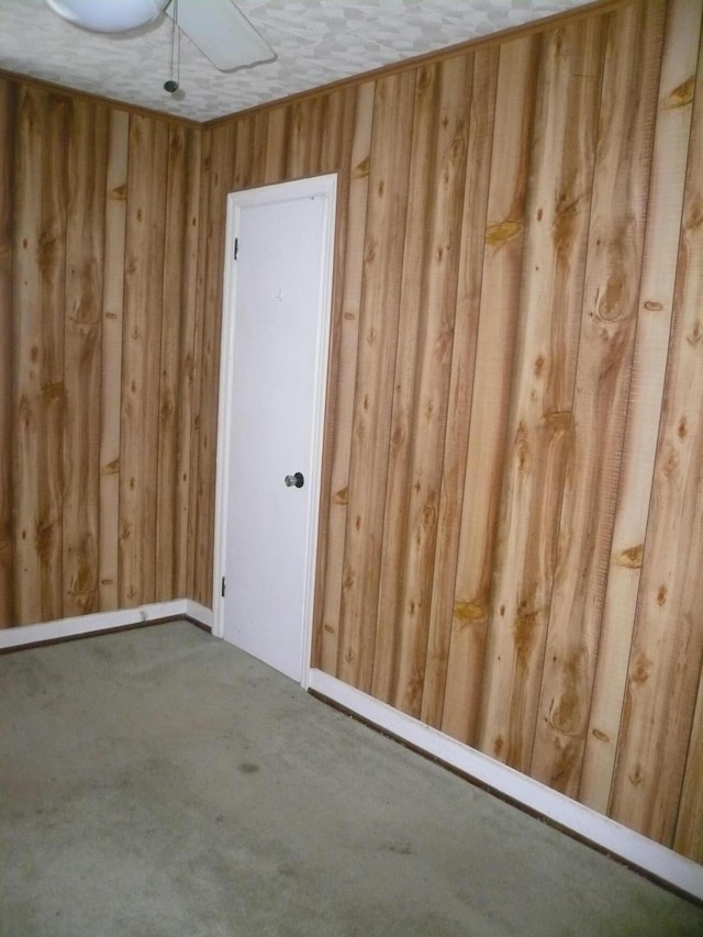 unfurnished room featuring a textured ceiling